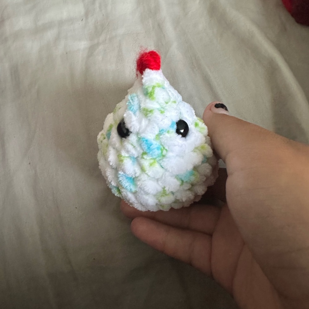 Crochet Pet Toy with Red and Blue Accents